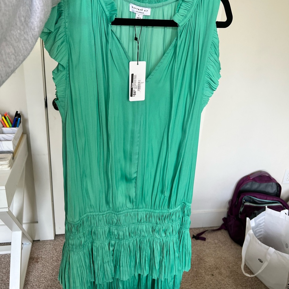 Jane Sleeveless pleated mini skirt dress.